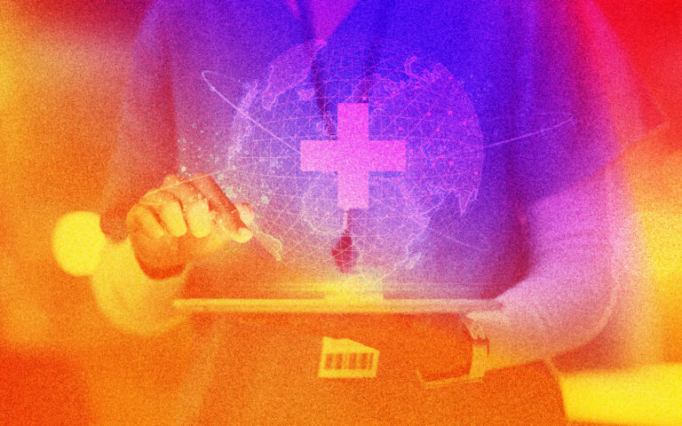 Colorful image of person at computer with medical cross.